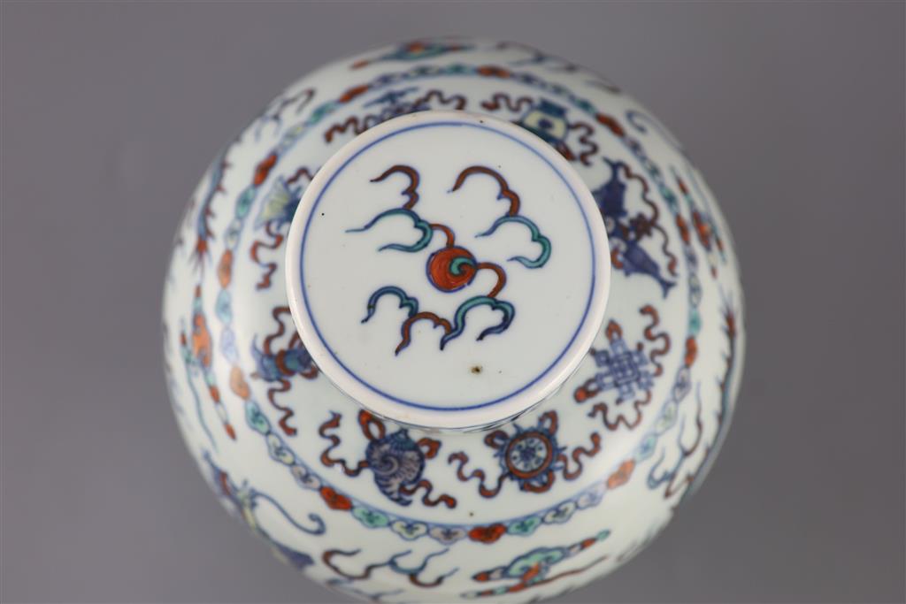 A Chinese doucai dragon jar and cover, Qianlong seal mark, late 19th/early 20th century, 20cm high, neck broken and glued